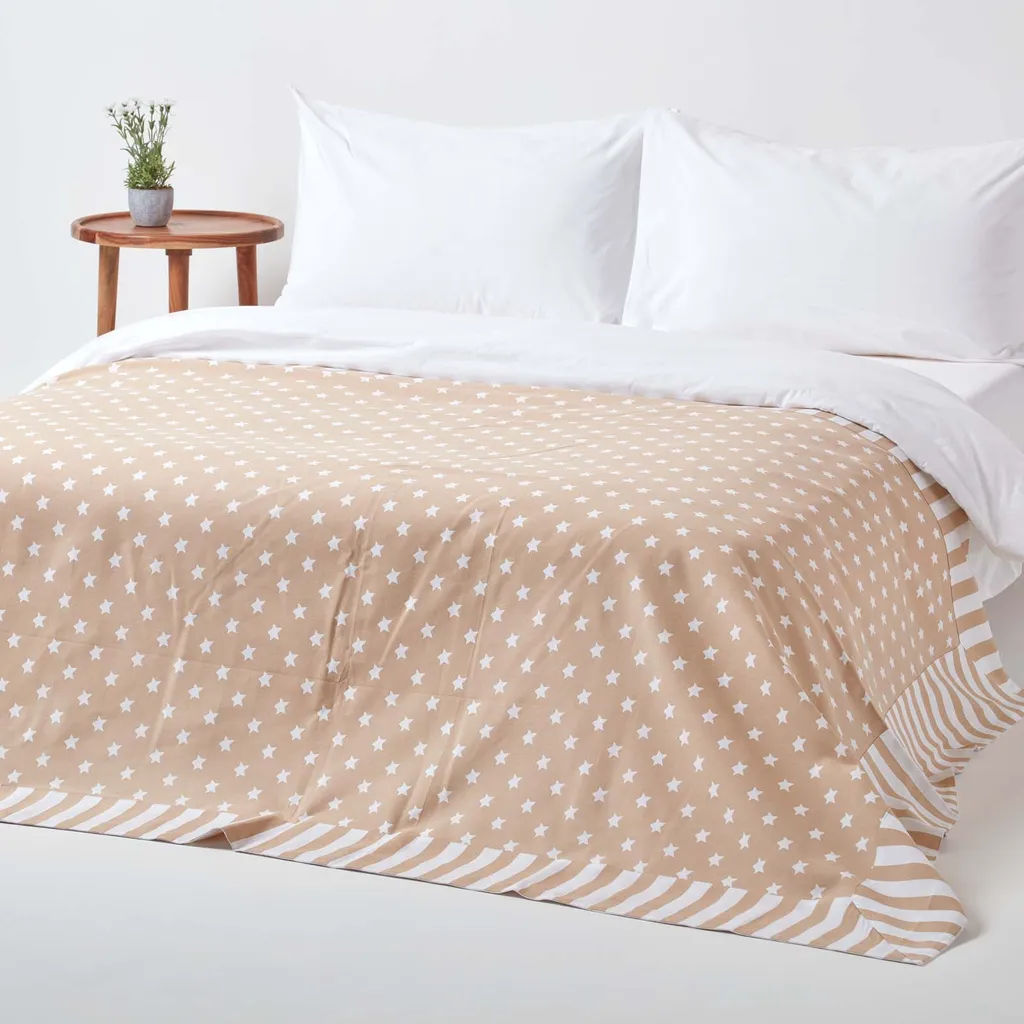 Jeté de lit à motif d'étoiles Homescapes en pur coton beige 150x200 cm
