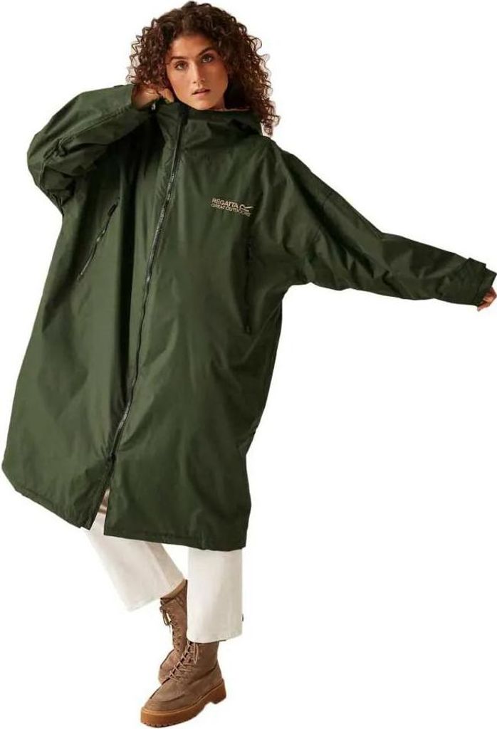 A woman wearing a green raincoat.