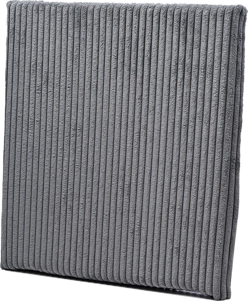 A close-up, studio shot of a gray corduroy cushion.
