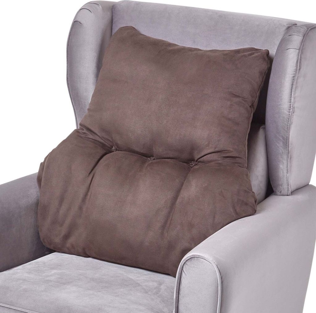 A brown lumbar support pillow is placed on a gray armchair.