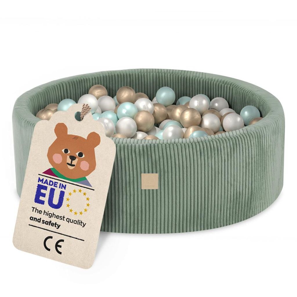 A green corduroy ball pit filled with colorful balls, with a tag attached.