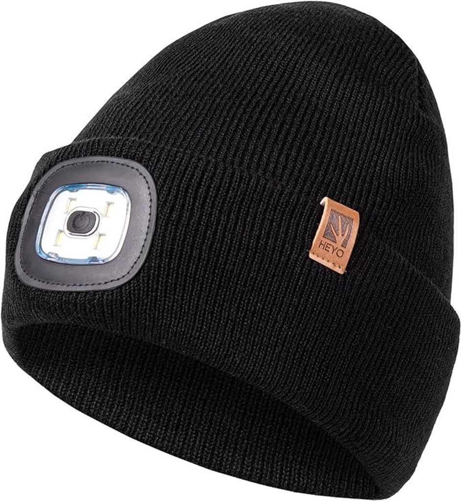 A black knitted beanie with an integrated LED light and a small leather brand tag.