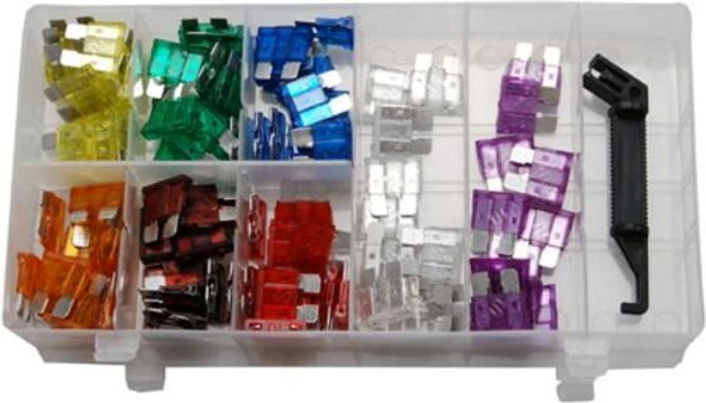 A clear plastic organizer box filled with various automotive fuses of different colors and amperages, along with a black fuse puller tool.
