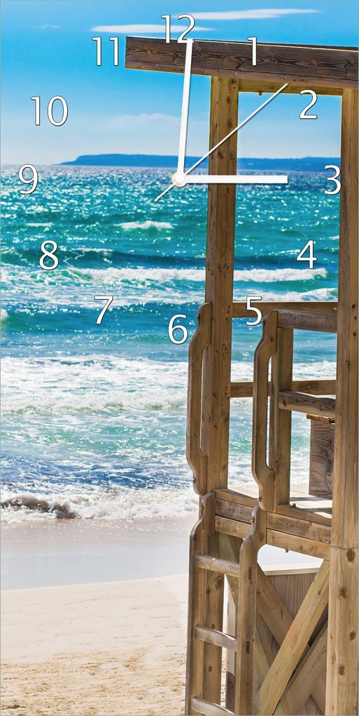 Wallario Design Wanduhr Badestrand - Mallorca Spanien aus Echtglas, Größe 30 x 60 cm