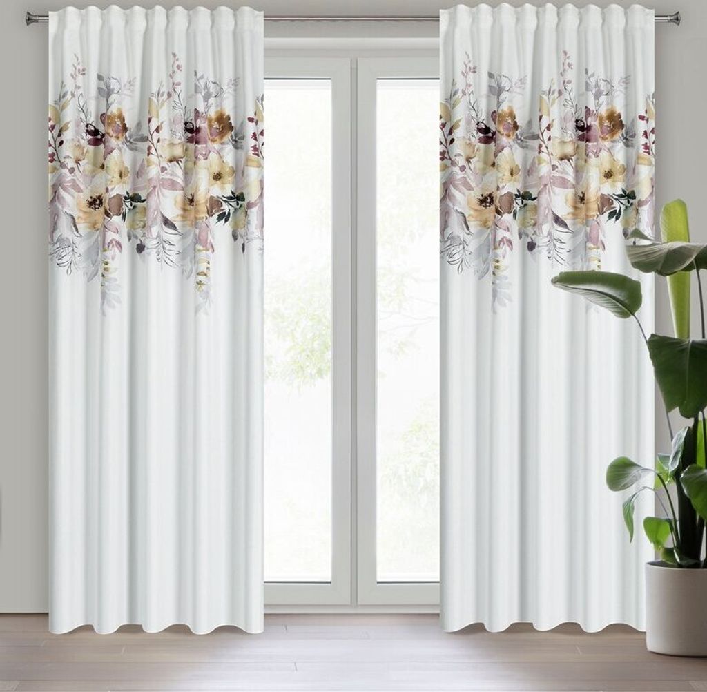 Two white curtains with a floral pattern at the top, hanging in front of a window.