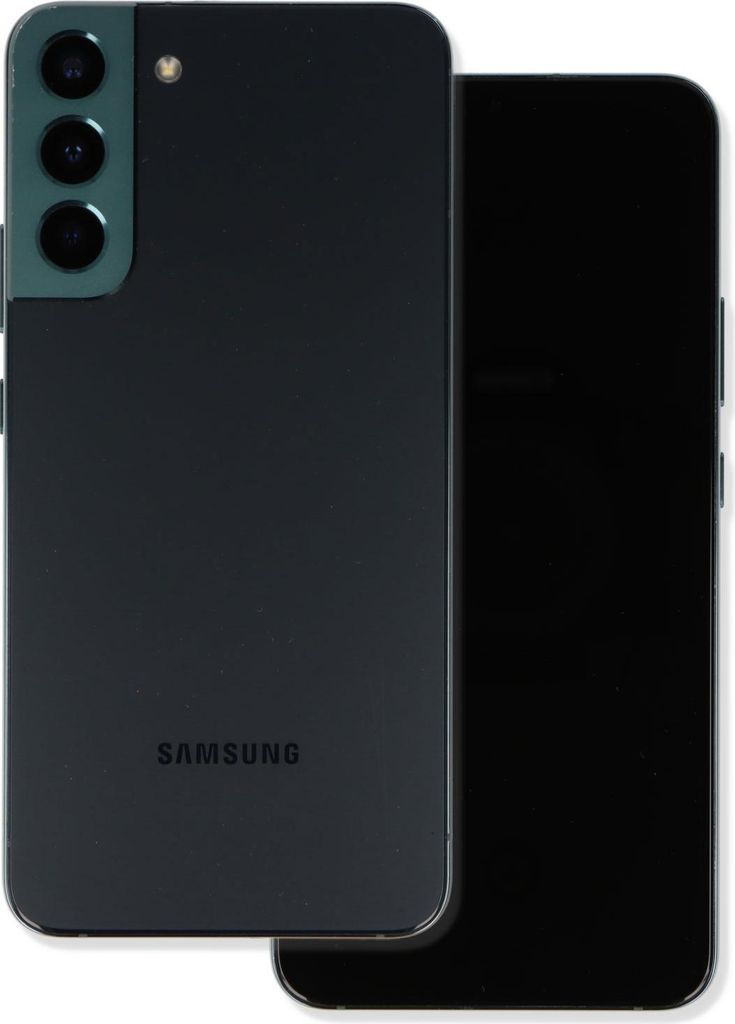 A dark green Samsung Galaxy S22+ smartphone is shown from the back, with its camera array visible. Another black smartphone is placed diagonally behind it.