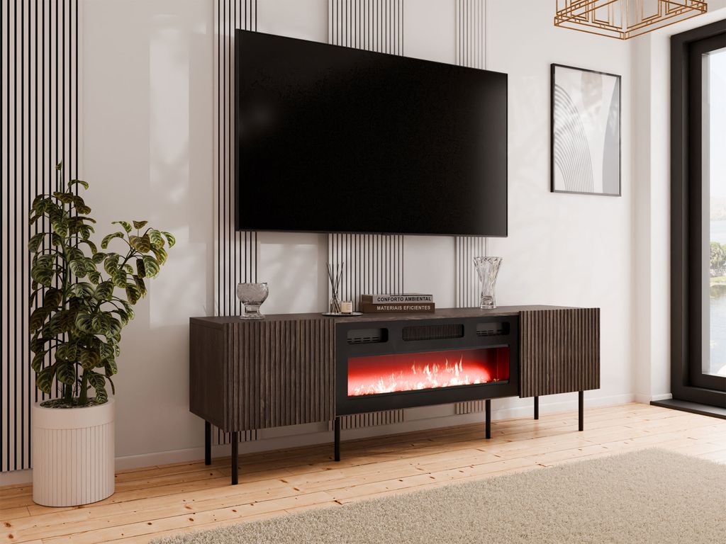 A modern living room setup featuring a TV stand with a fireplace, a large television, and a potted plant.