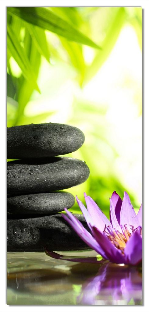 Wallario selbstklebende Türtapete 100 x 220 cm mit Schutzlaminat - Steinstapel in schwarz mit Blumenblüte in lila