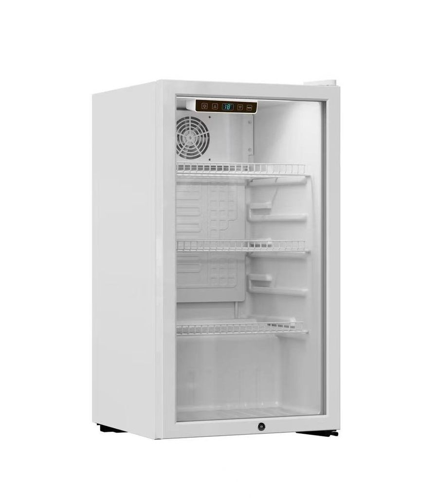 A white beverage cooler with a glass door, showing its interior shelves and a digital temperature display.