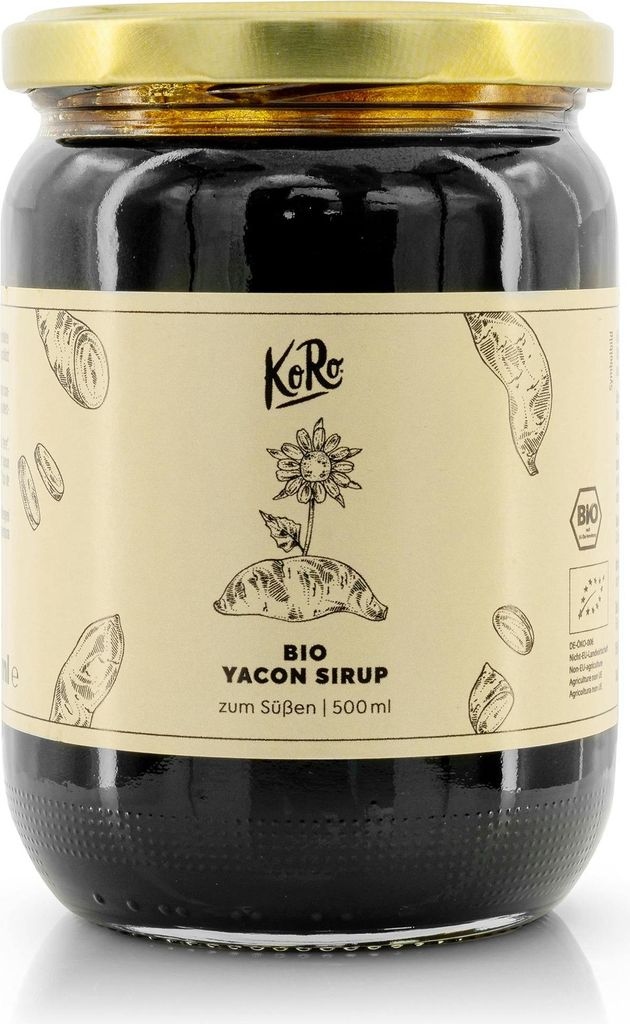 A glass jar of Yacon Syrup with a label.