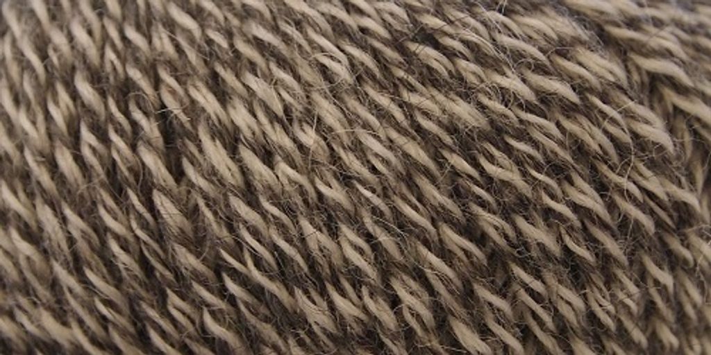 Schulana Alpwool Eco Mouline 50g Fb.20 weiß-anthrazit