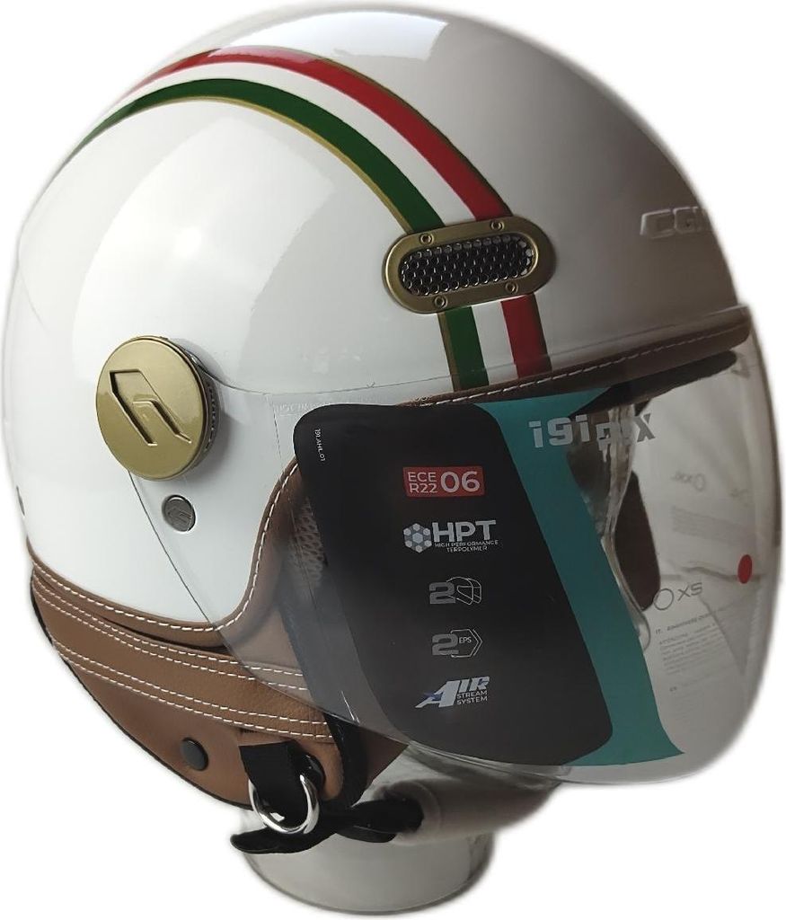 A white motorcycle helmet with green, red, and gold stripes, and a clear visor.