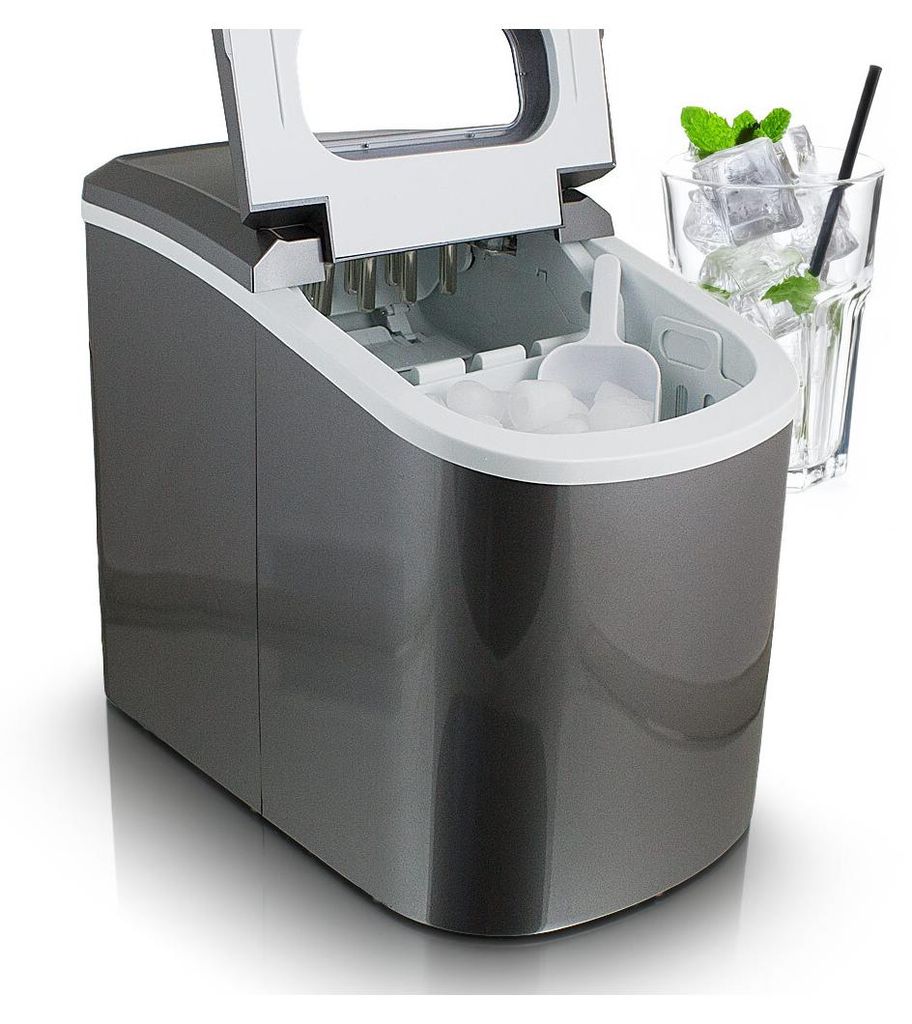 A dark gray ice maker with its lid open, showing ice cubes inside. A glass of ice water with mint and a straw is visible to the right.