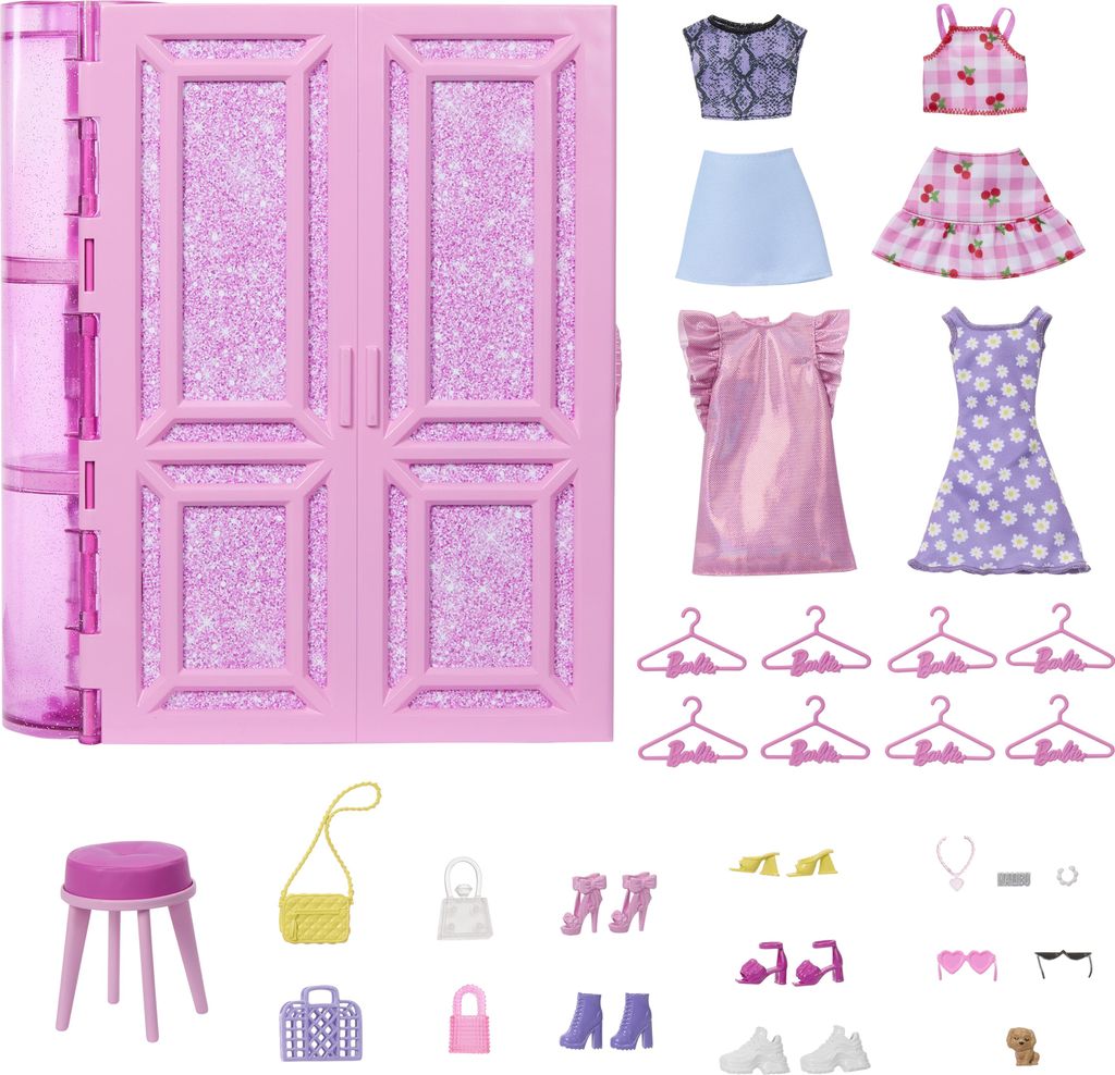 A collection of Barbie doll clothes and accessories laid out on a white background, with a pink doll wardrobe in the background.