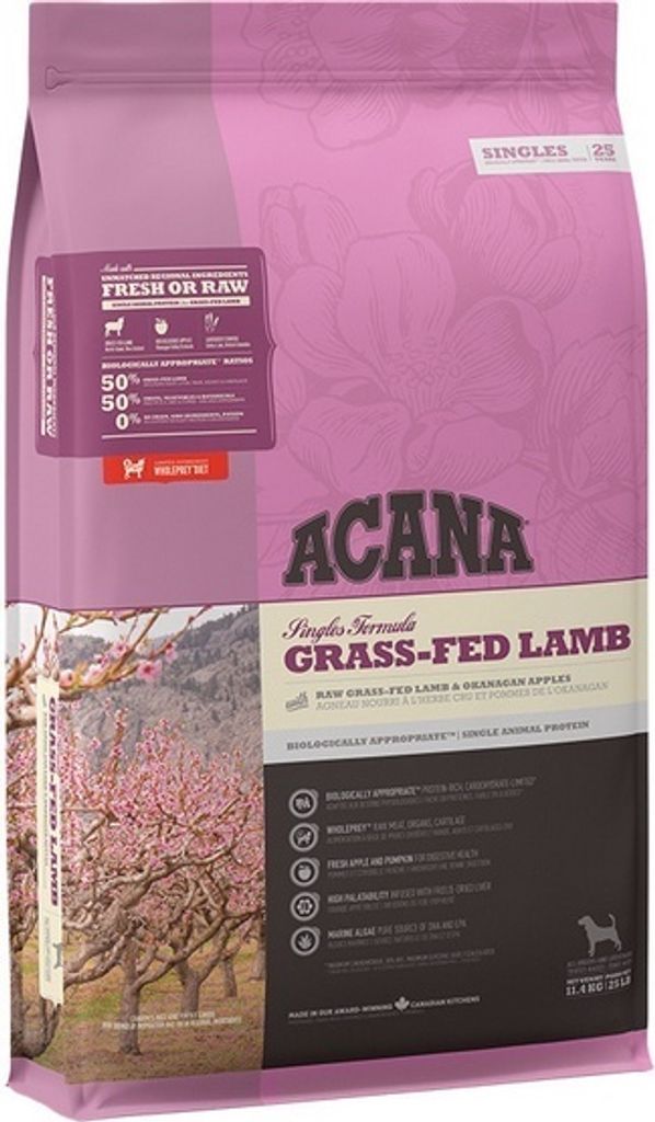 A bag of Acana dog food with a picture of a tree with pink blossoms.