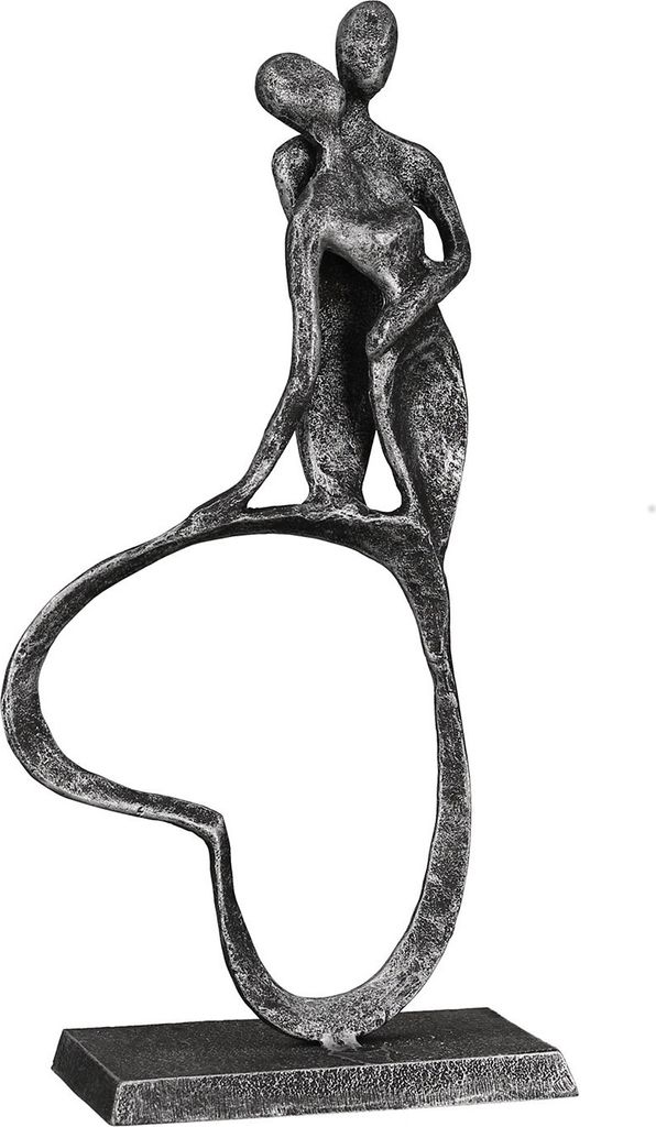 A decorative sculpture of two figures embracing, made of metal with an antique silver finish, standing on a rectangular base.