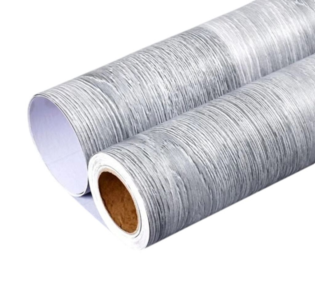 Two rolls of wood-effect adhesive wallpaper are shown against a white background.