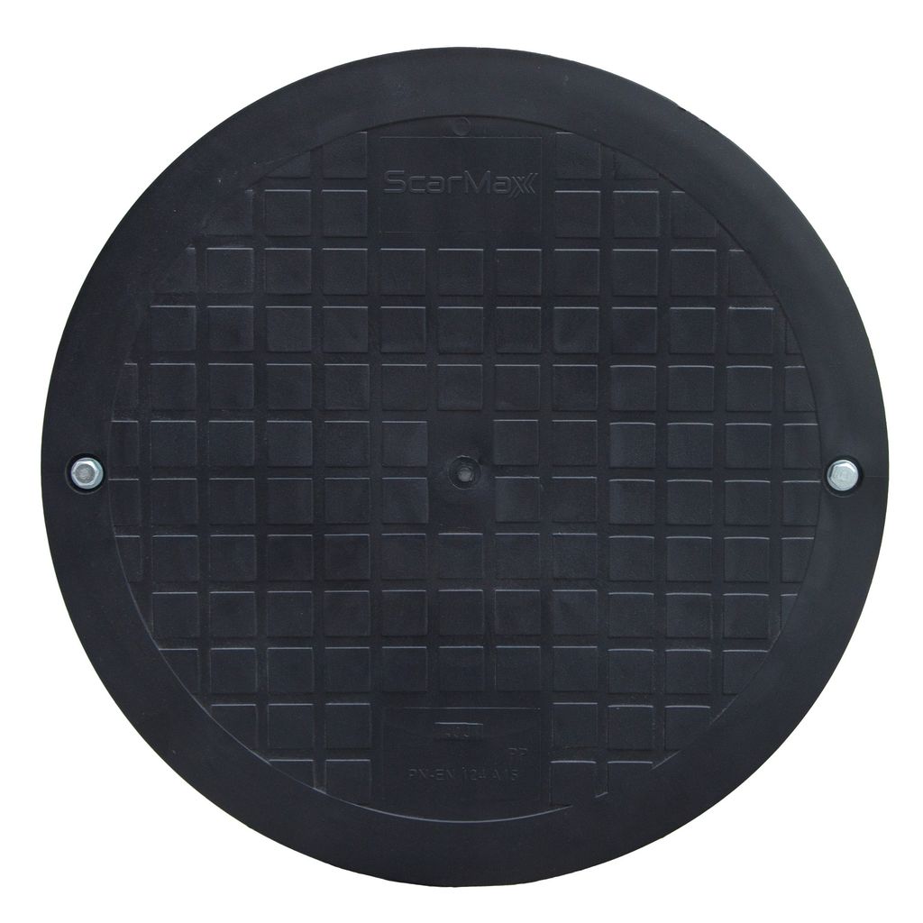 A black circular manhole cover with a grid pattern.