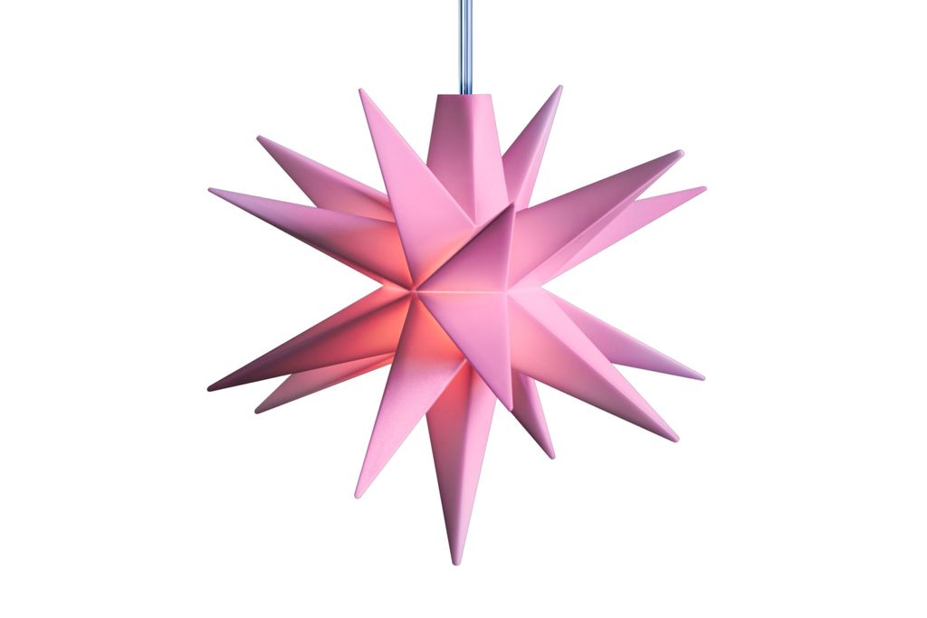 A pink star-shaped lamp is shown against a white background.