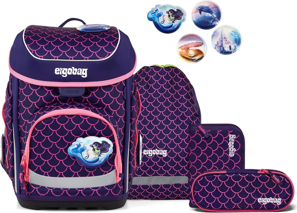 A collection of school supplies including a backpack, a drawstring bag, and pencil cases, all featuring a mermaid scale pattern.