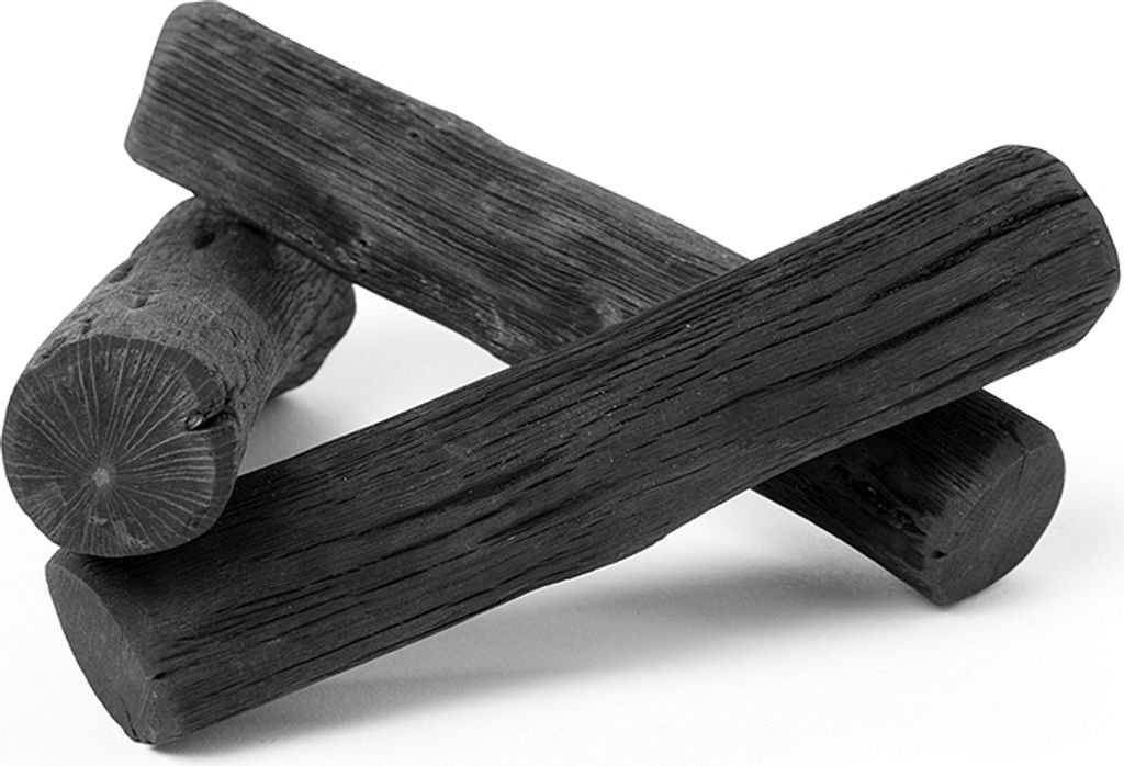 Three charcoal sticks are arranged in a pile on a white background.