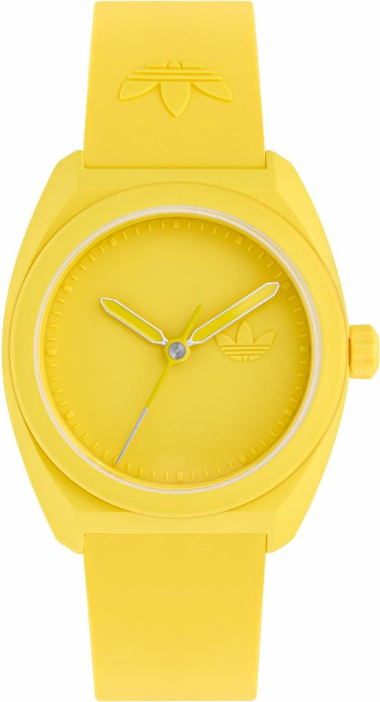 A studio shot of a yellow Adidas watch against a white background.