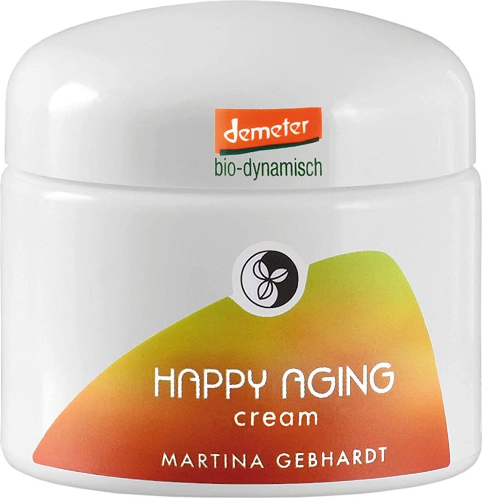 A white jar of Martina Gebhardt Happy Aging cream with a colorful gradient label.
