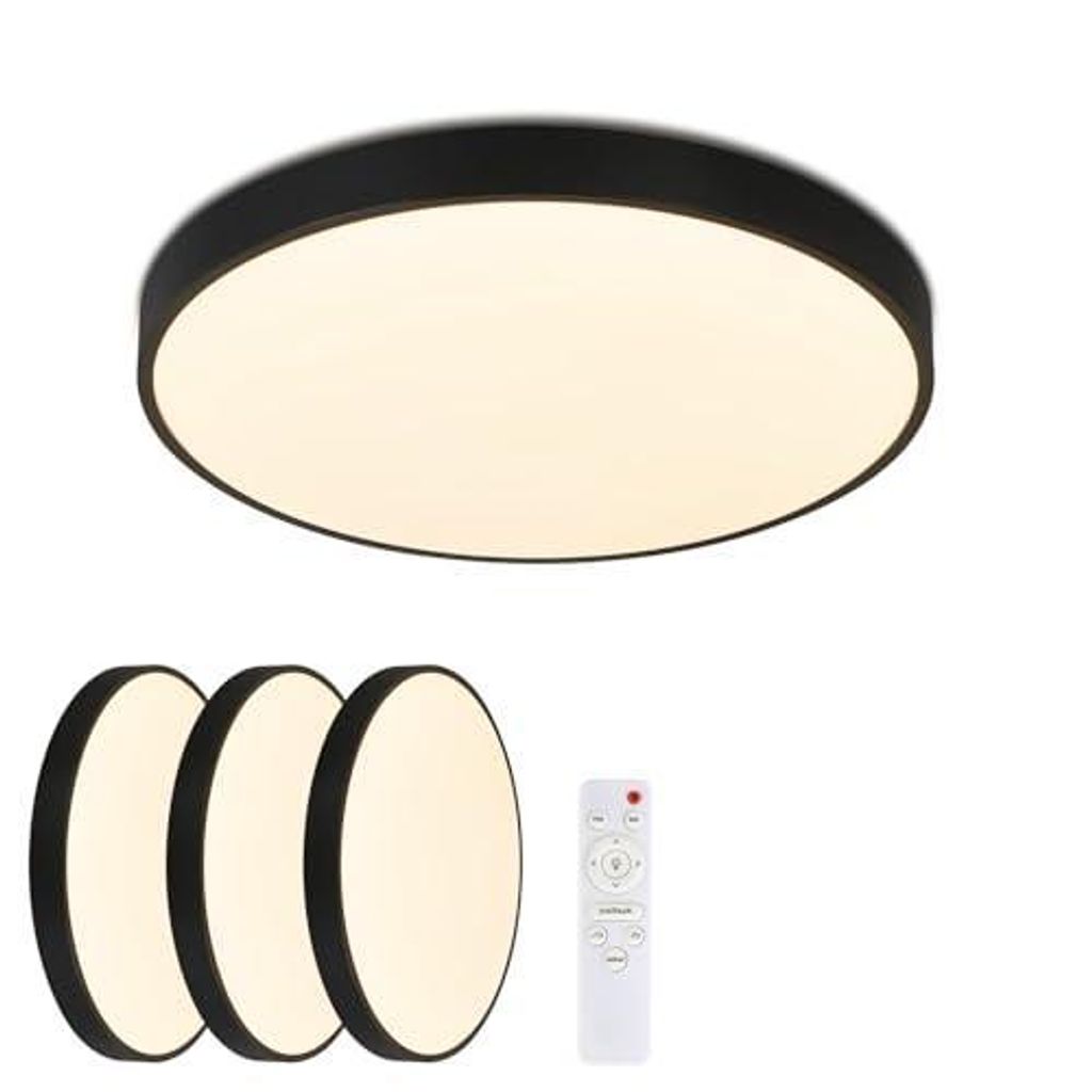 A product shot of a ceiling light and three smaller circular lights, along with a remote control, against a white background.