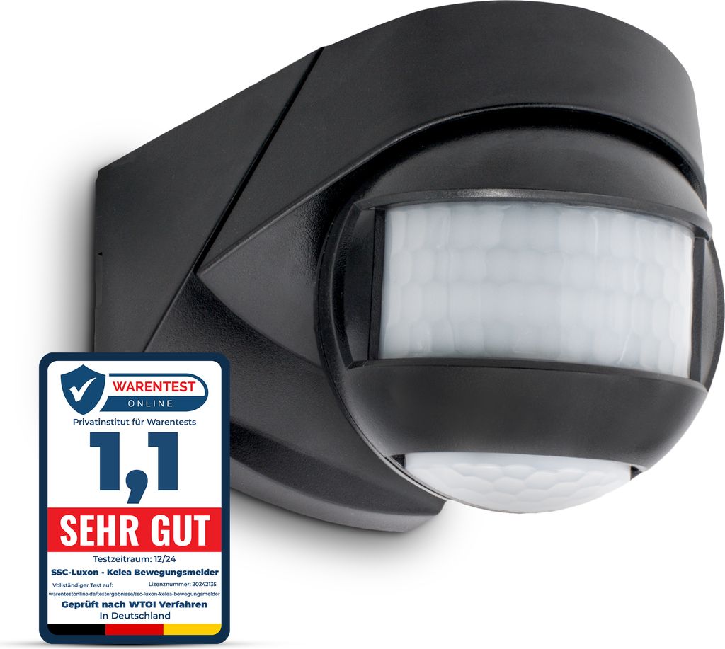 A black motion detector mounted on a wall, with a quality seal in the foreground.