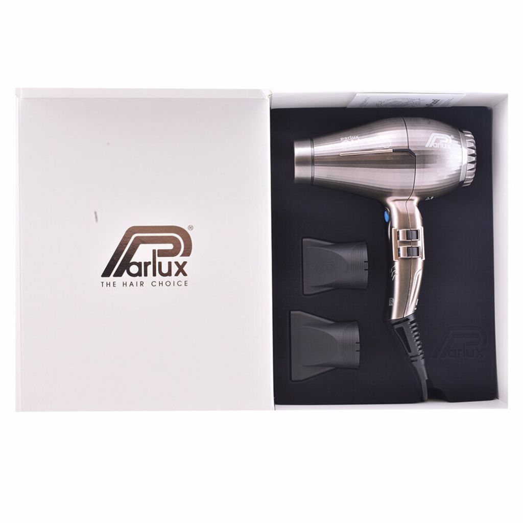 A hairdryer and its accessories are displayed inside an open box.