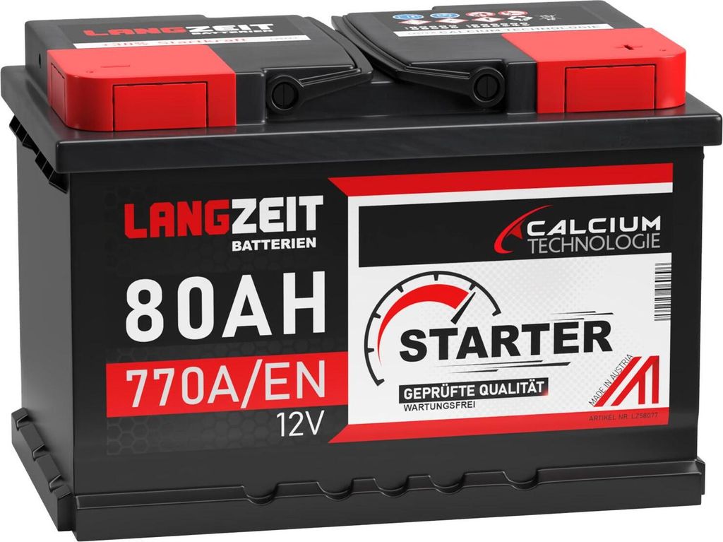 A black car battery with red and white branding.