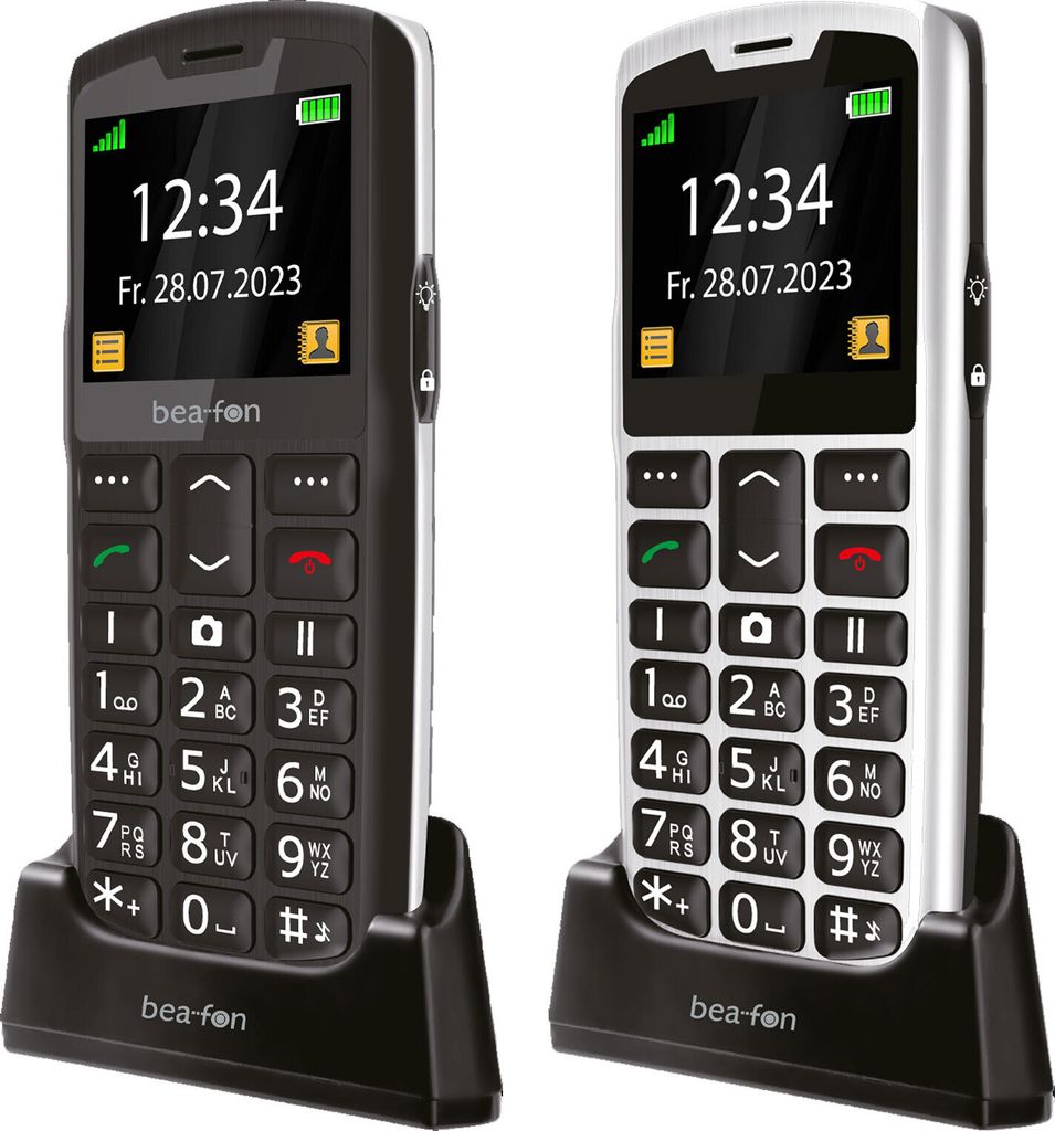 Two Beafon SL260 mobile phones, one black and one silver, are shown in their charging docks against a white background.