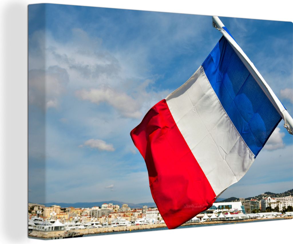 OneMillionCanvasses - Leinwandbilder - 150x100 cm, Französische Flagge mit Blick auf Cannes, Wandbilder Kunstdruck Wanddekoration