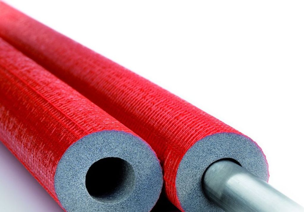 Two red pipe insulation tubes are shown against a white background. The tubes are cut to reveal the grey foam insulation and a silver metal pipe inside.