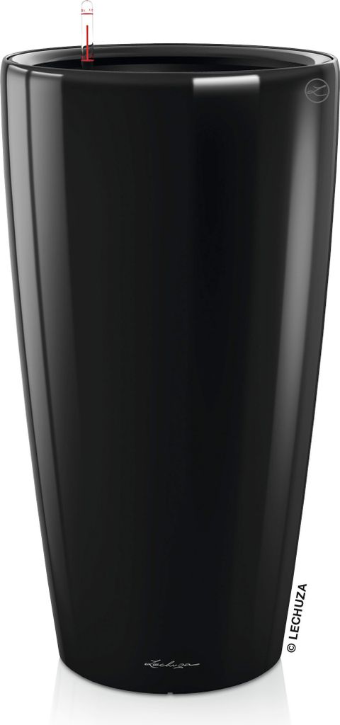 A tall, glossy black planter with a water level indicator visible at the top.