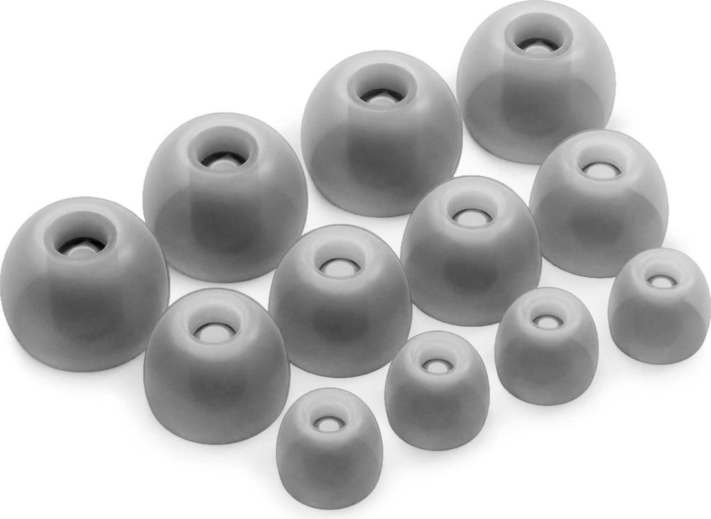 A collection of different sized ear tips for earbuds, arranged on a white background.