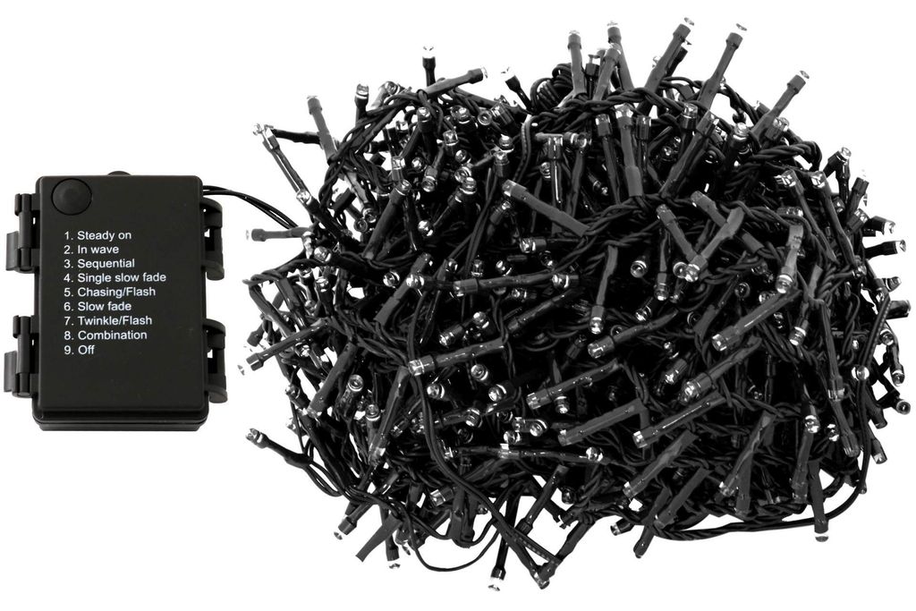A black battery pack with function labels and a tangled pile of black LED string lights.