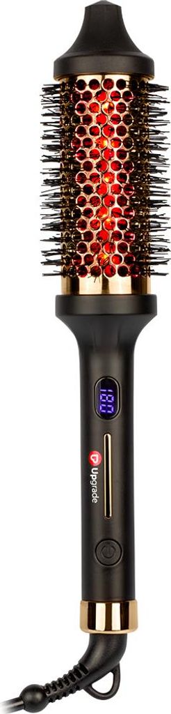 A black and gold thermal hair brush with a red glowing barrel, shown against a white background.