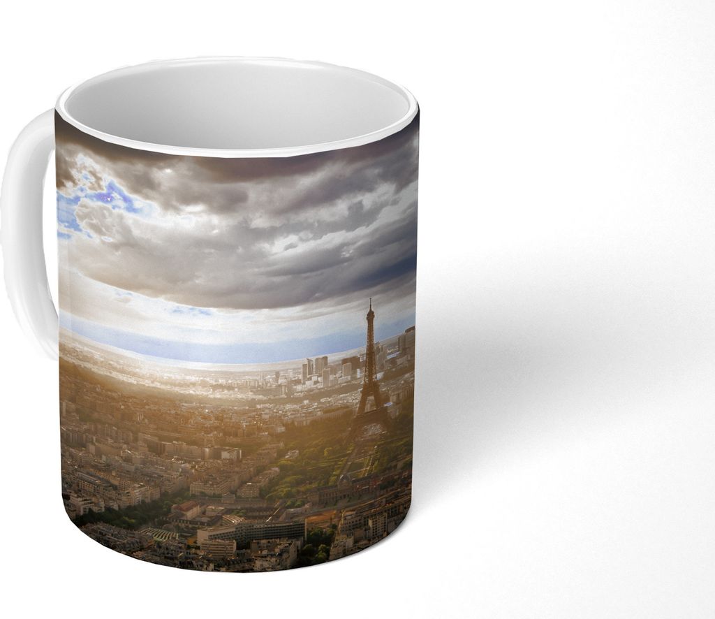 MuchoWow Tasse Kaffeetasse Kaffeebecher 350 ml Schöne Skyline über Paris mit hellen Sonnenstrahlen, die den Eiffelturm beleuchten Teetasse - Fo...