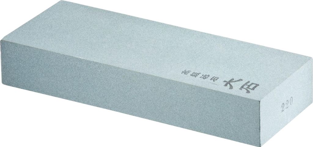 A rectangular sharpening stone on a white background.