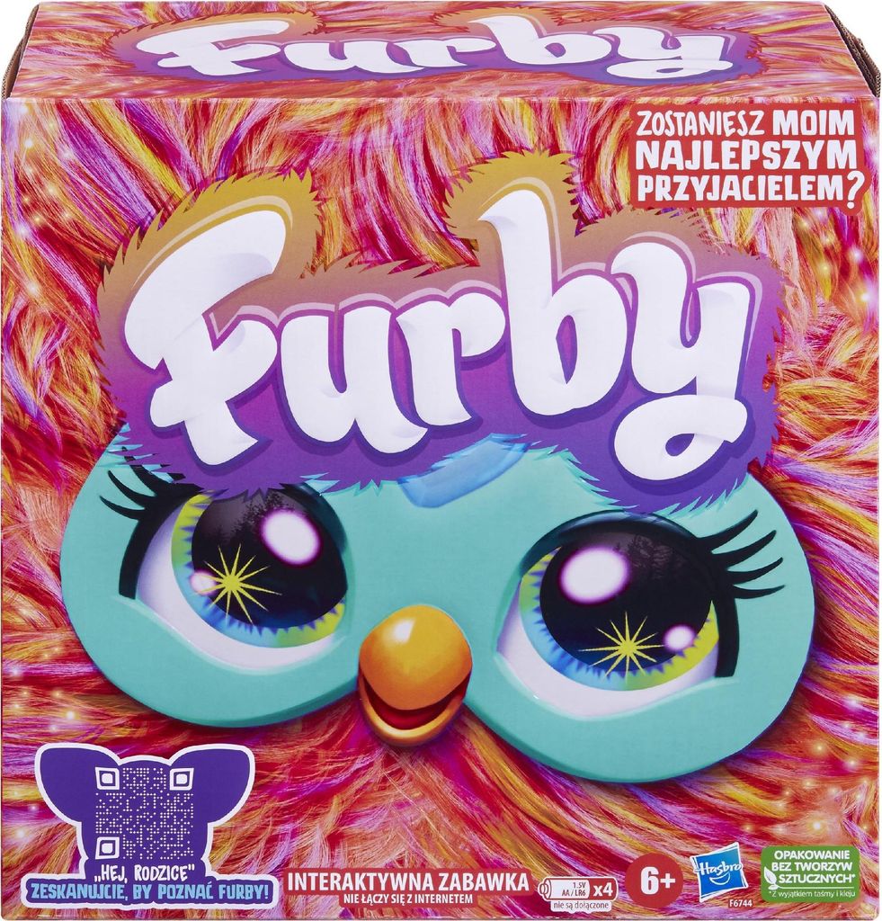 The image shows the front of a Furby toy box with a colorful, furry design and the Furby logo prominently displayed.