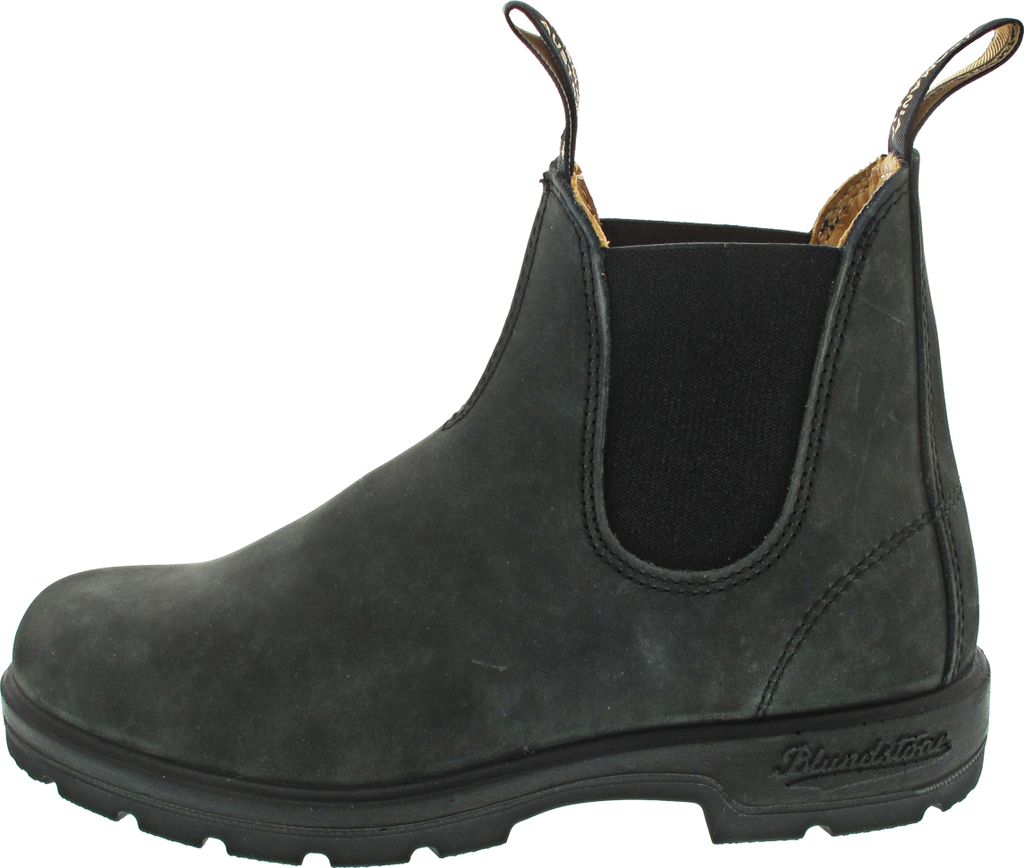 A side view of a black Blundstone boot.