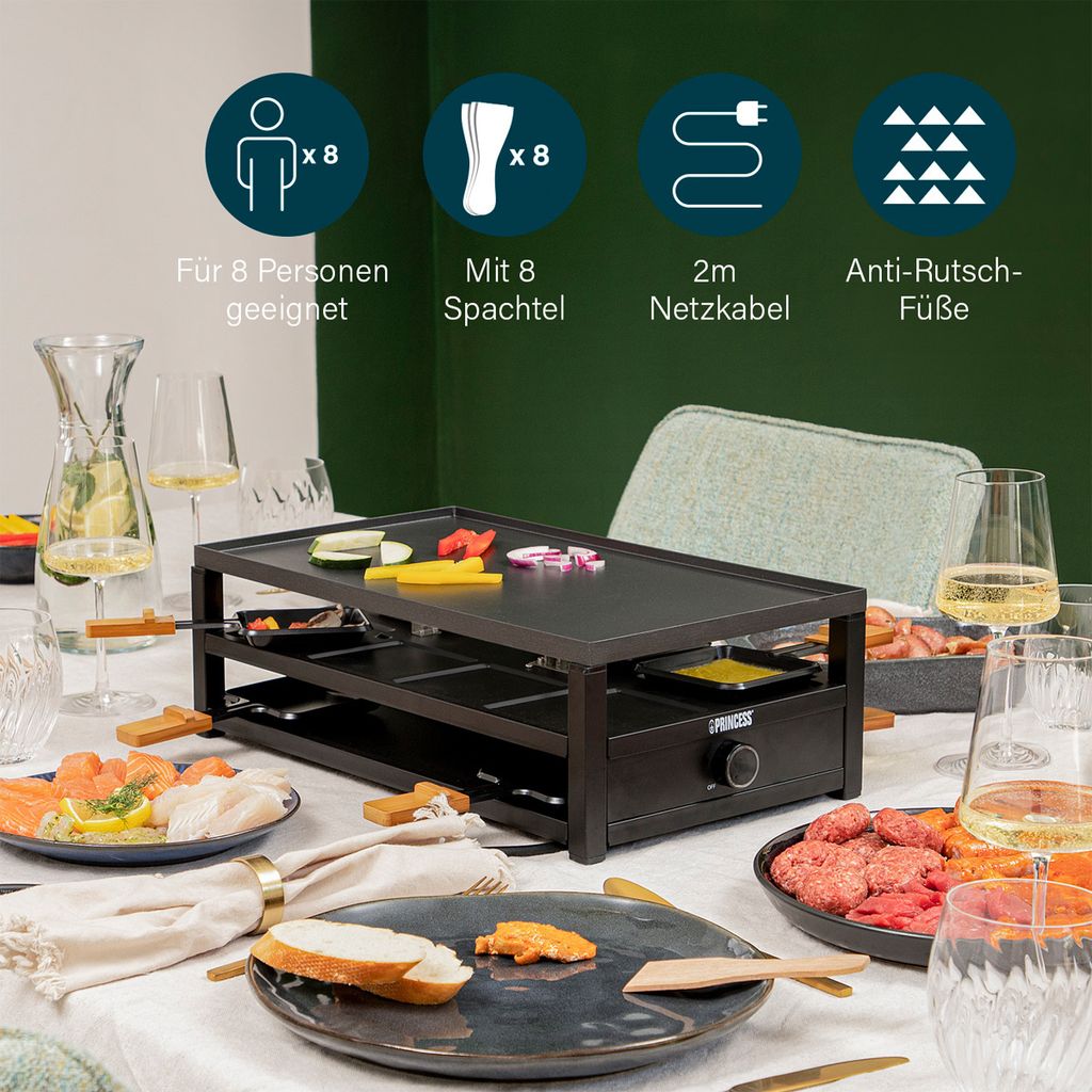 A raclette grill set up on a table with food and drinks, set for a meal.