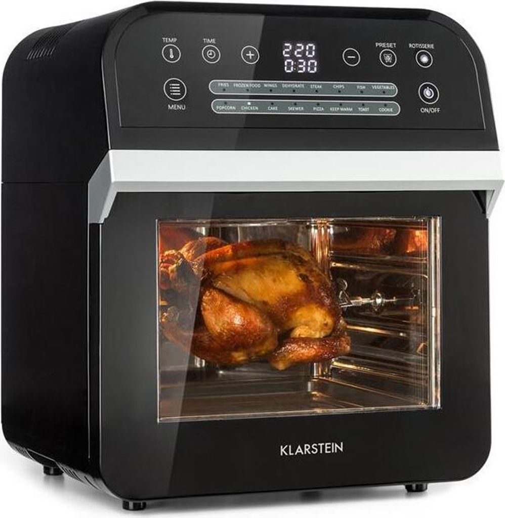 A black Klarstein air fryer oven with a roasted chicken inside, displayed on a white background.