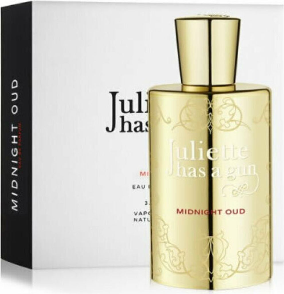 A gold perfume bottle and its packaging are displayed against a white background.