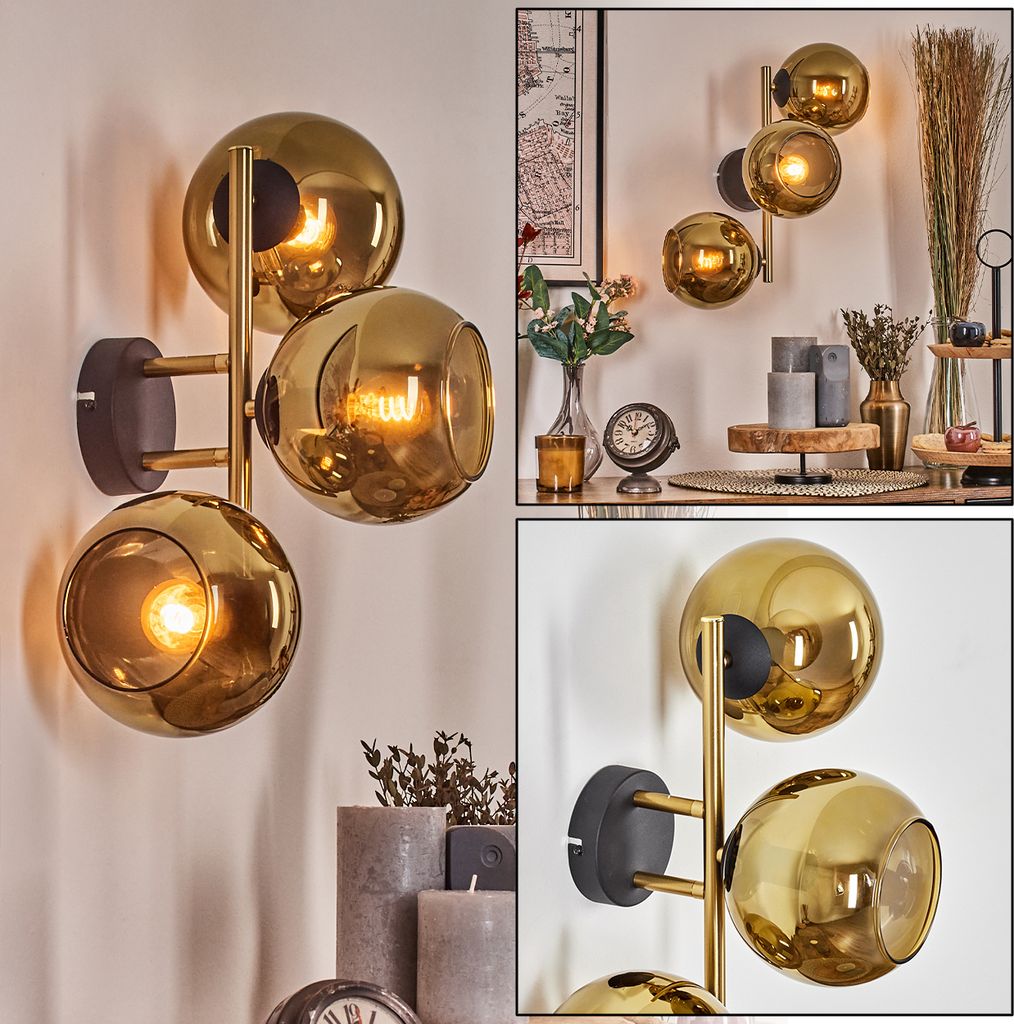 Cesaro Wandlampe aus Metall/Glas in Schwarz/Goldfarben