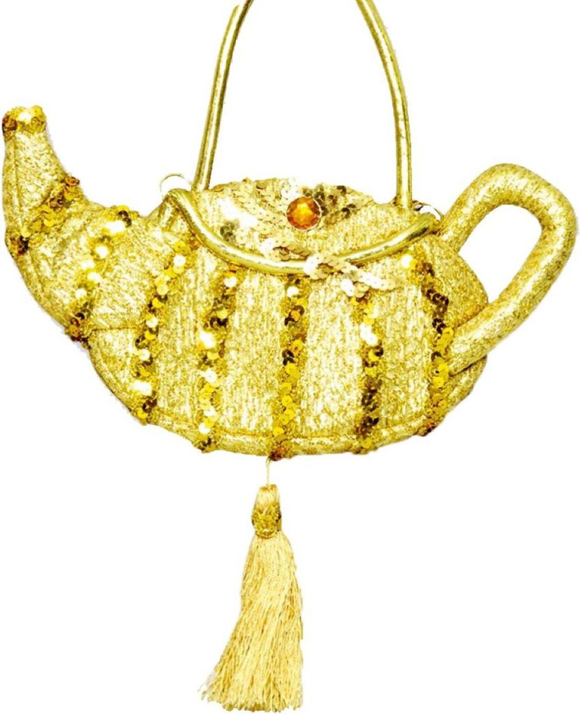 A golden teapot-shaped handbag with sequins and a tassel, displayed against a white background.
