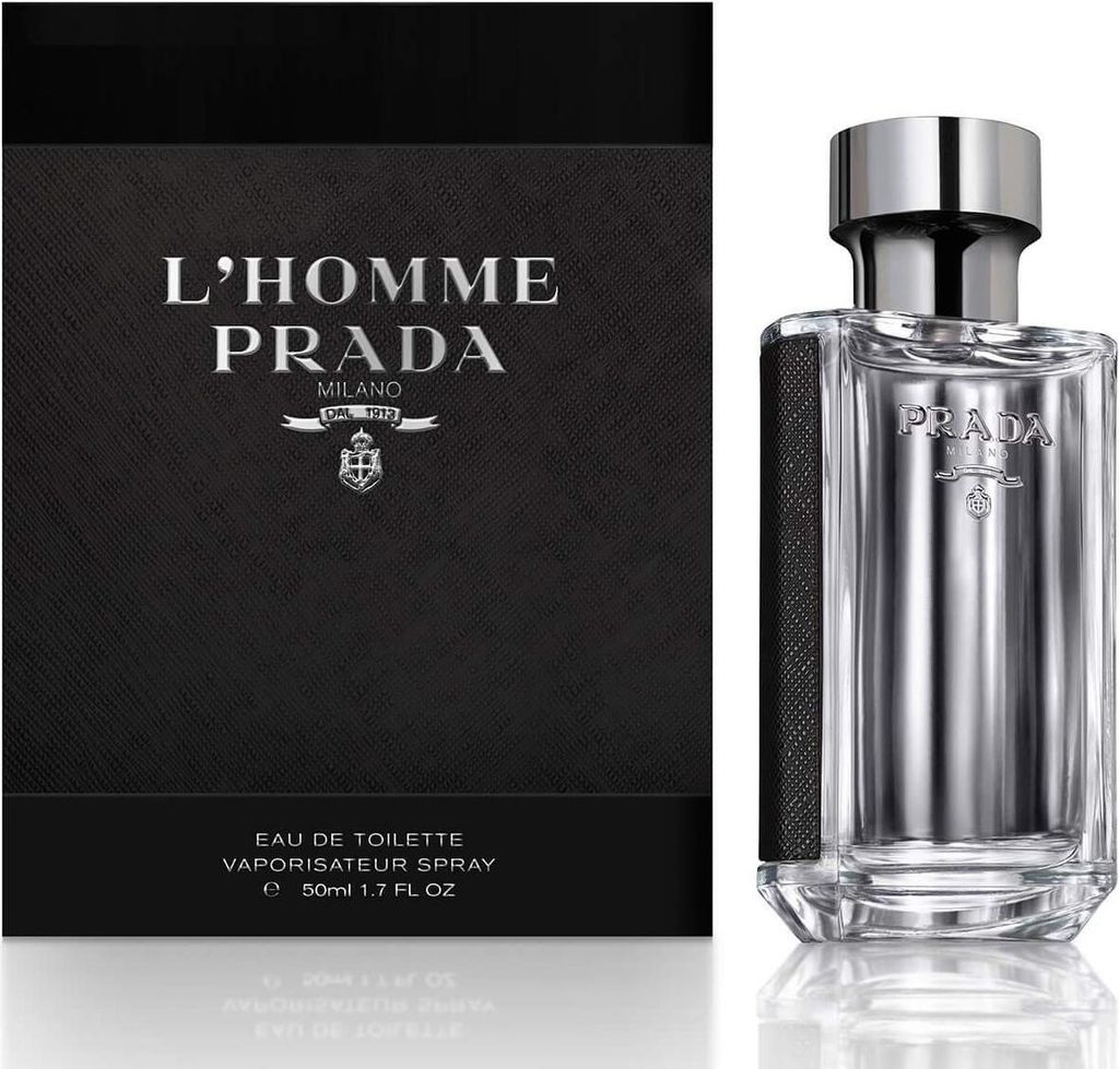 A product shot of a bottle of Prada L'Homme Eau de Toilette next to its packaging.