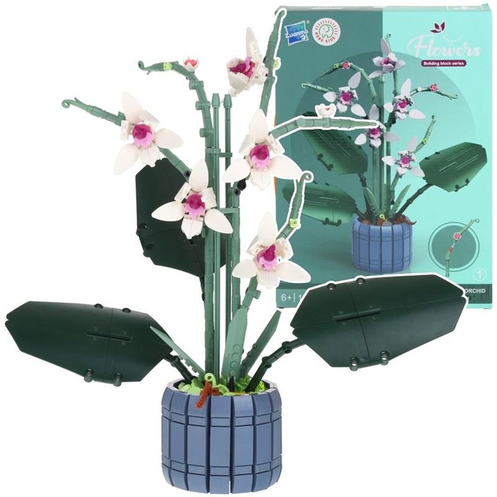 A building block model of an orchid in a pot, with its packaging in the background.