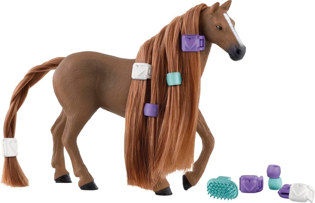 A toy horse with long brown hair decorated with colorful hair clips and accessories.